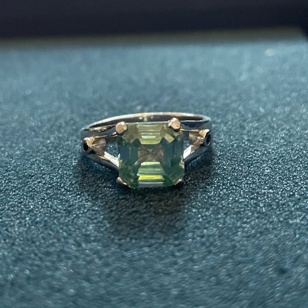Greenish blue moissanite sterling ring. Size 7.5 to 7.75